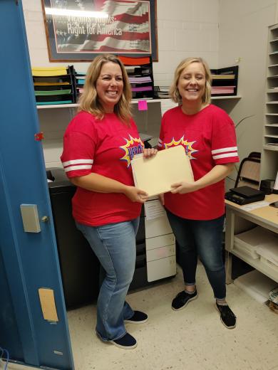 women holding a file folder