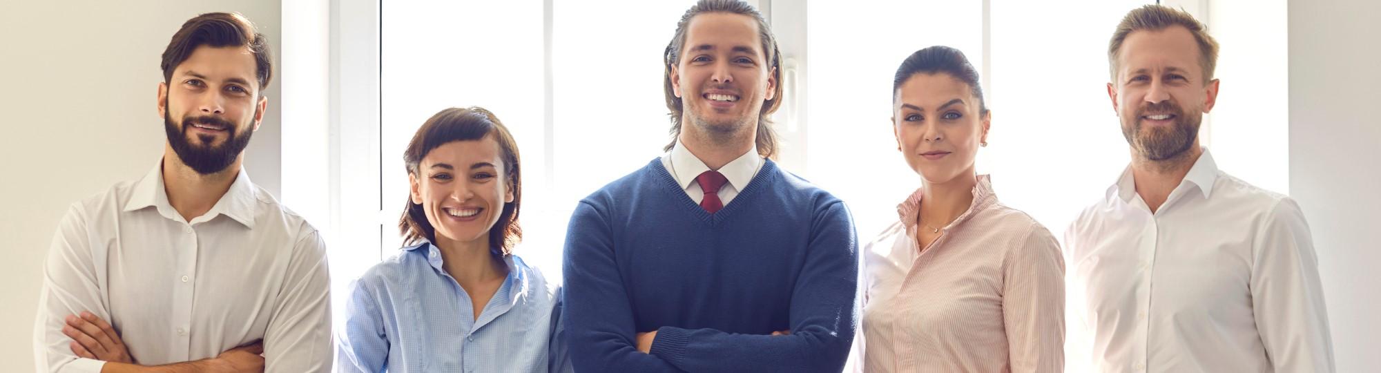 Business Professionals Standing in front of Window